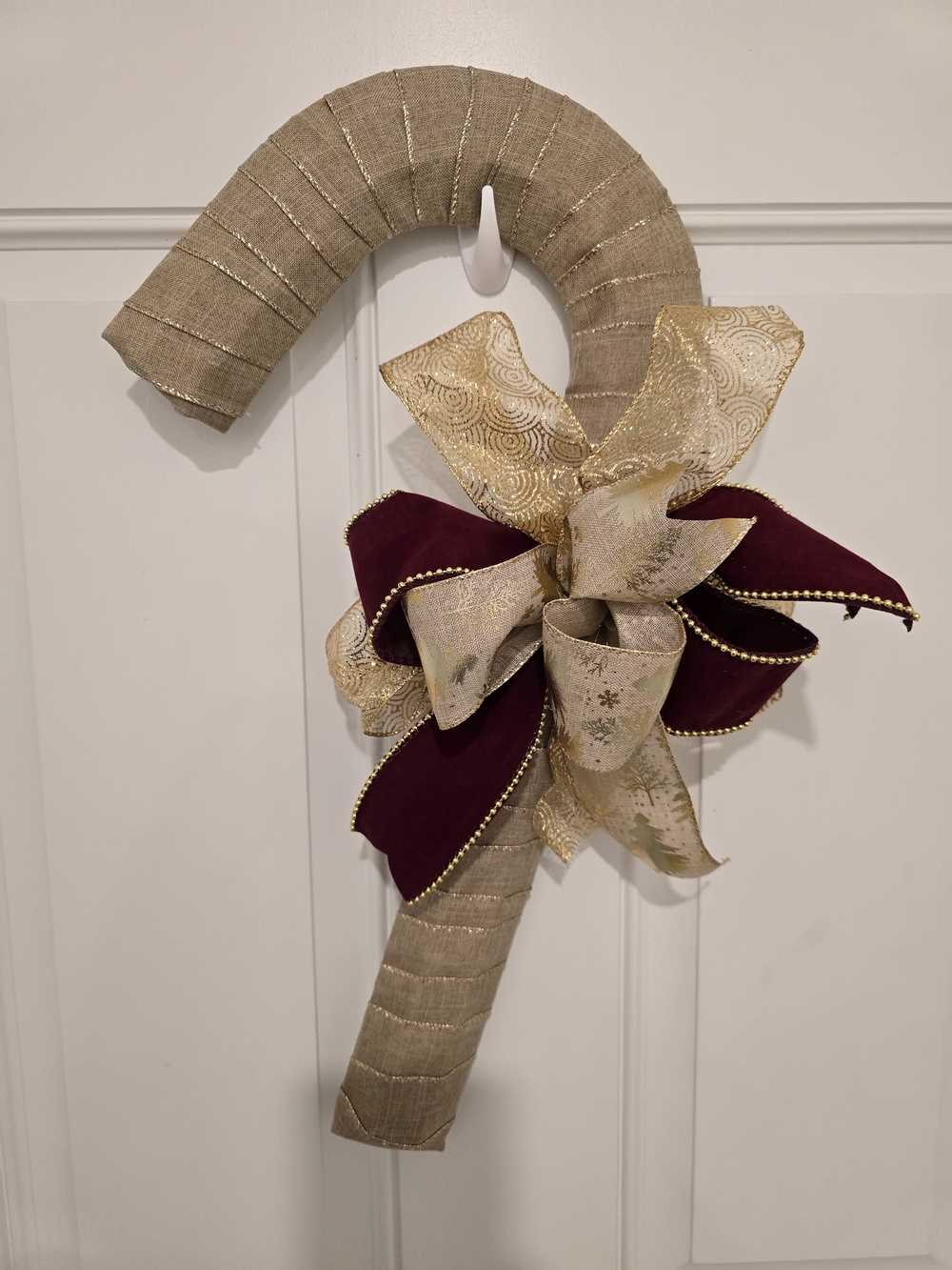 Holiday Candy Cane Door Decor with Gold and Burgundy Bow